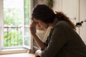 Worried frustrated young woman feeling depressed and lonely