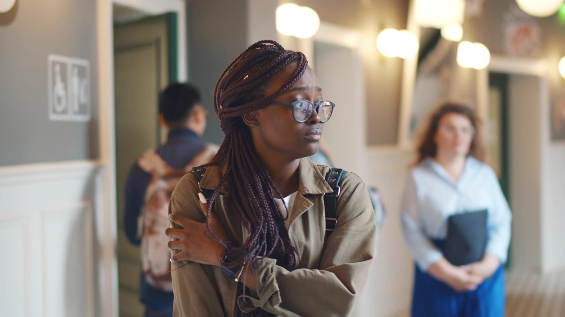 socially anxious girl in the school corridor